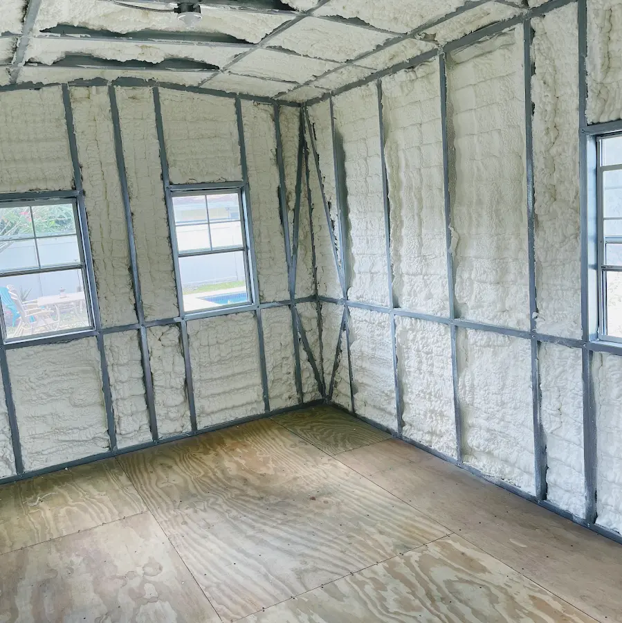 Closed-cell spray foam insulation applied to wall cavities in a residential project in Opp